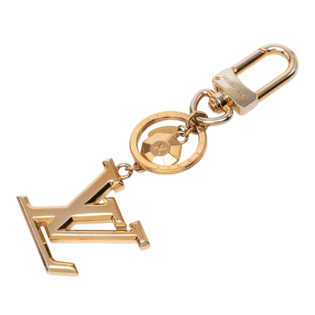 Louis Vuitton Gold Plated LV Facettes Bag Charm and Key Holder Gold Metal Very good - Front View