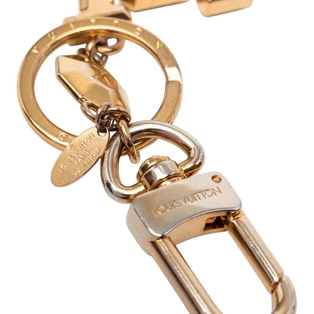 Louis Vuitton Gold Plated LV Facettes Bag Charm and Key Holder Gold Metal Very good - Model View