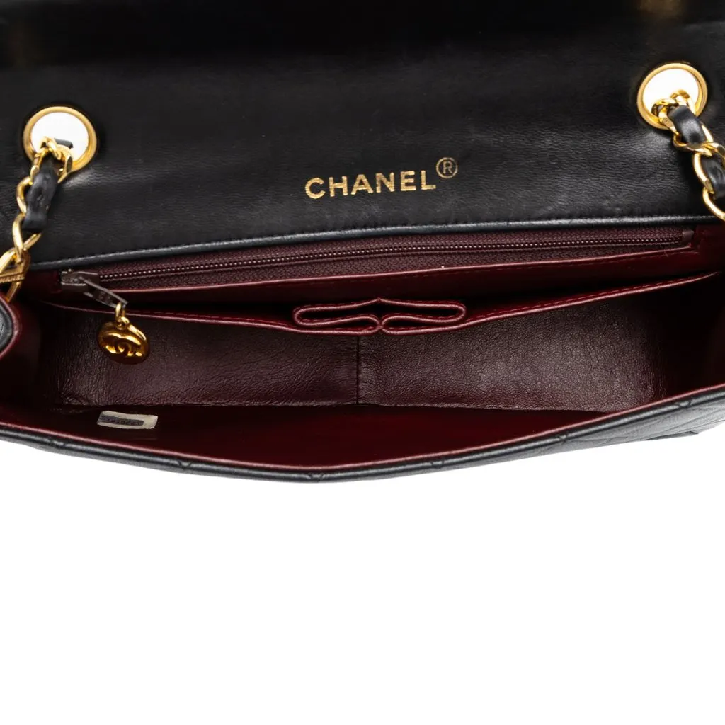 Chanel CC Quilted Lambskin Full Single Flap Black Leather Good - Model View