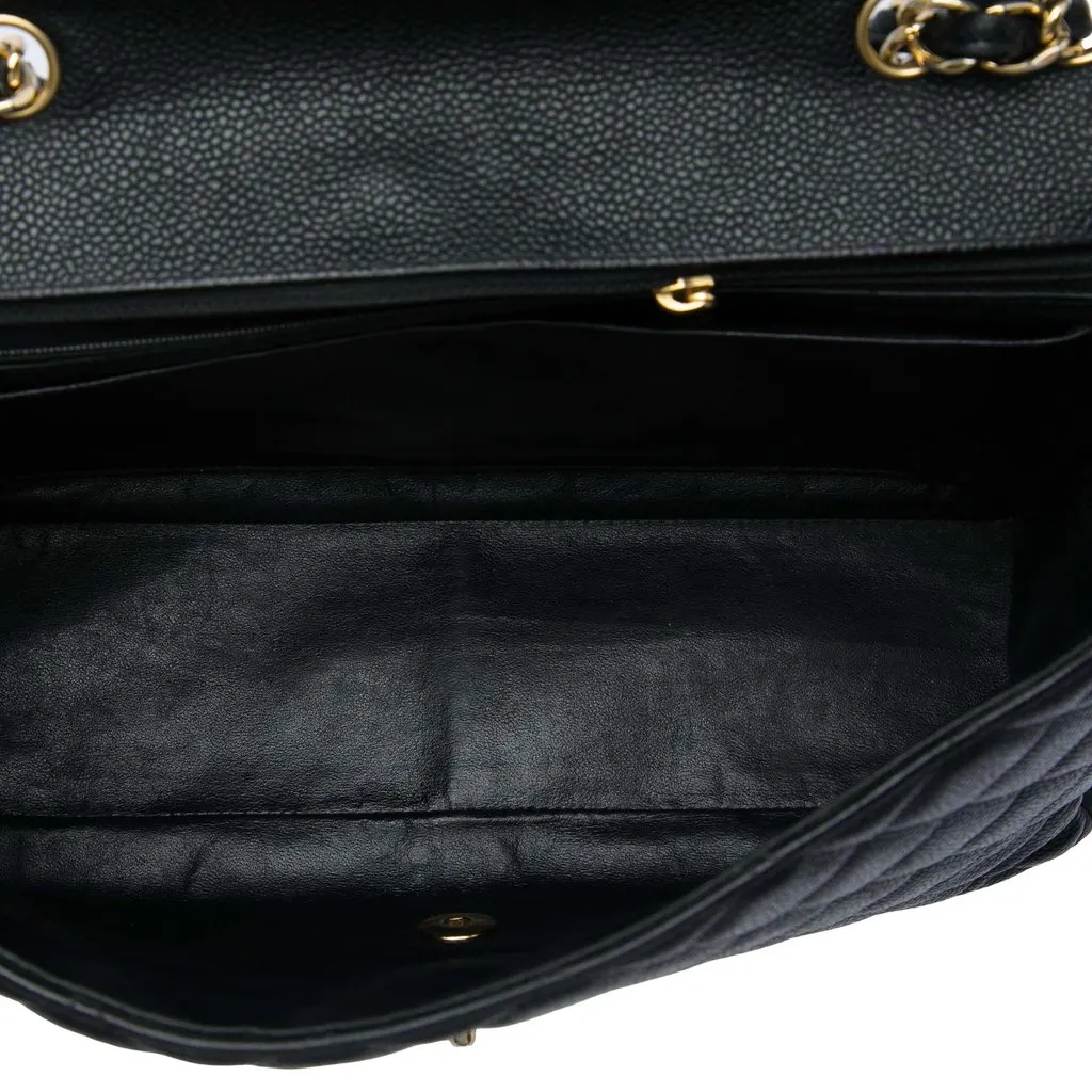 Chanel Jumbo Classic Caviar Single Flap Black Leather Good - Model View