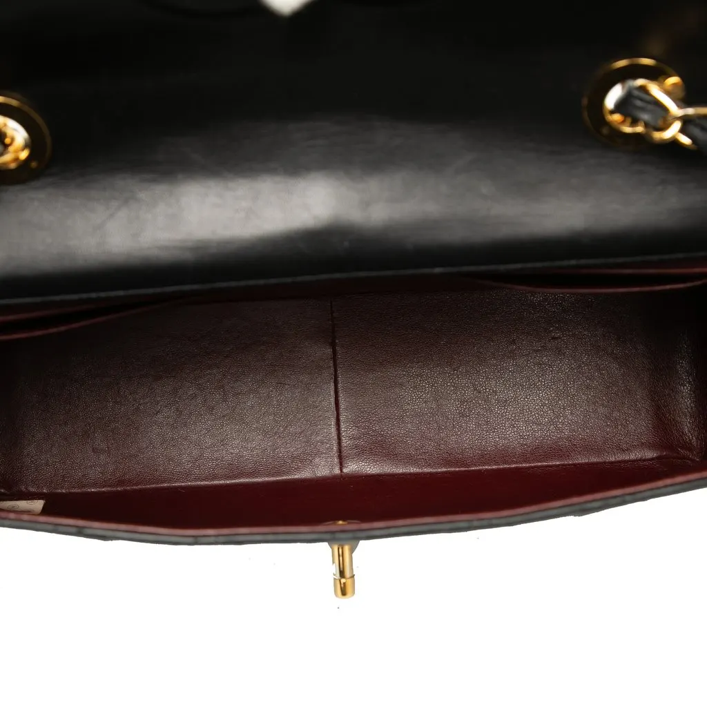 Chanel Maxi XL Classic Lambskin Single Flap Black Leather Good - Model View