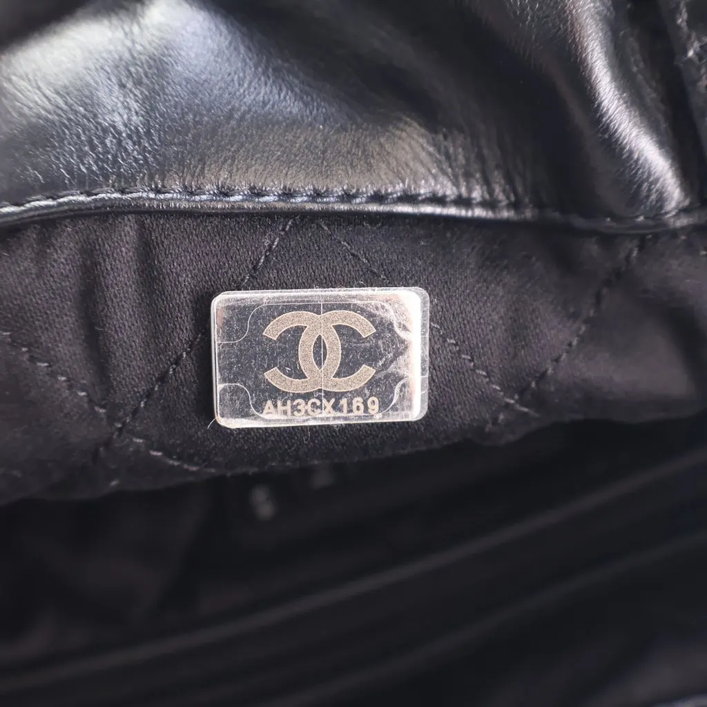 Chanel Large Quilted Shiny Calfskin 22 Backpack Black Leather Very good - Model View