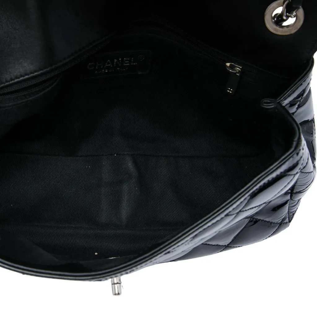 Chanel Medium Patent Coco Shine Flap Black Leather Good - Model View