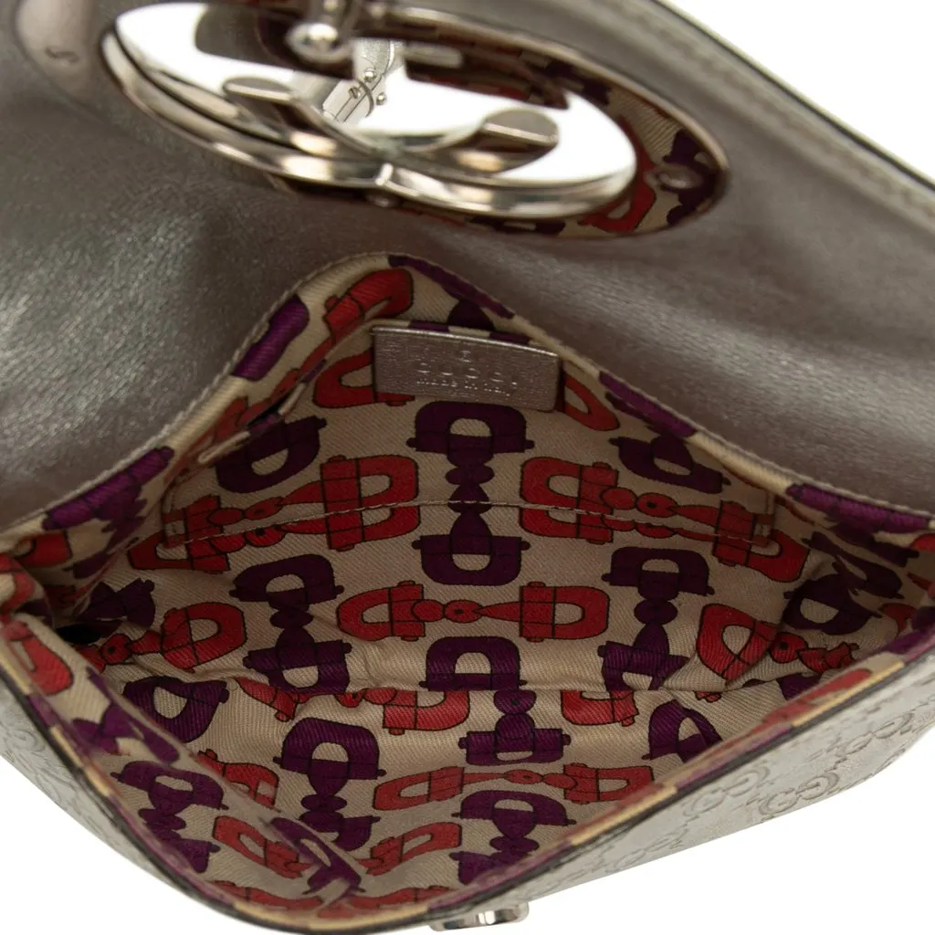 Gucci Medium Metallic Guccissima Britt Tassel Flap Handbag Silver Leather Very good - Model View