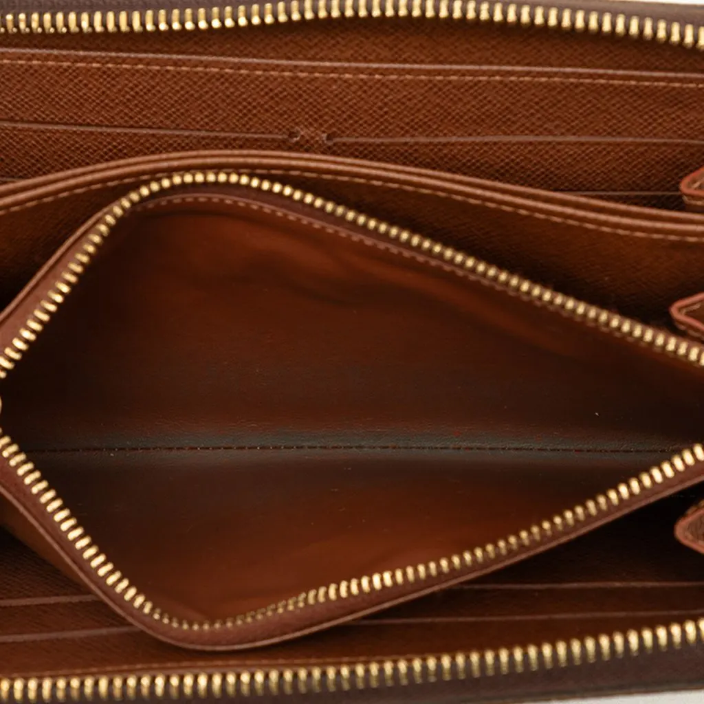 Louis Vuitton Monogram Zippy Wallet Brown Canvas Good - Model View