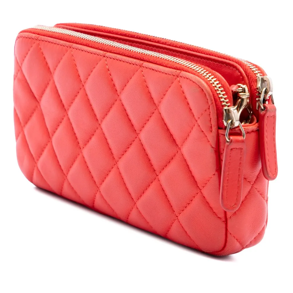 Chanel CC Quilted Lambskin Double Zip Clutch With Chain Orange Leather Very good - Back View