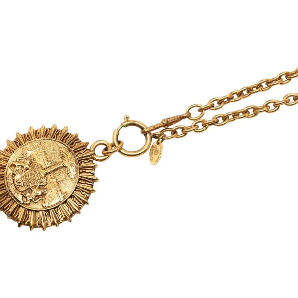 Chanel Gold Plated Medallion Coat of Arms Sunburst Pendant Necklace Gold Metal Very good - Model View