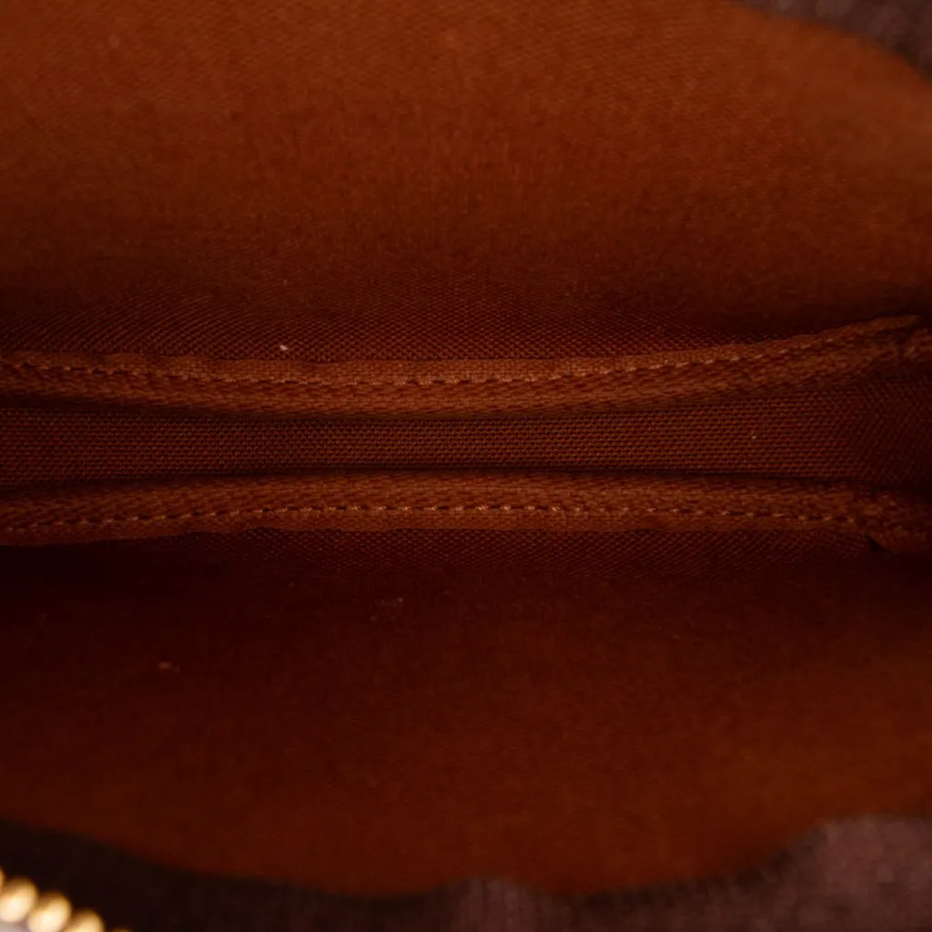 Louis Vuitton Monogram Mini Pochette Accessoires Brown Canvas Never worn - Model View