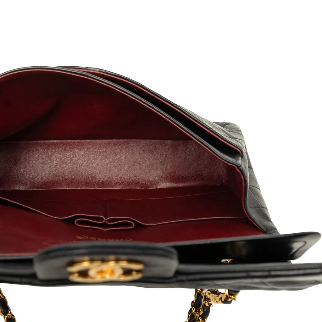 Chanel Medium Classic Lambskin Double Flap Black Leather Good - Model View