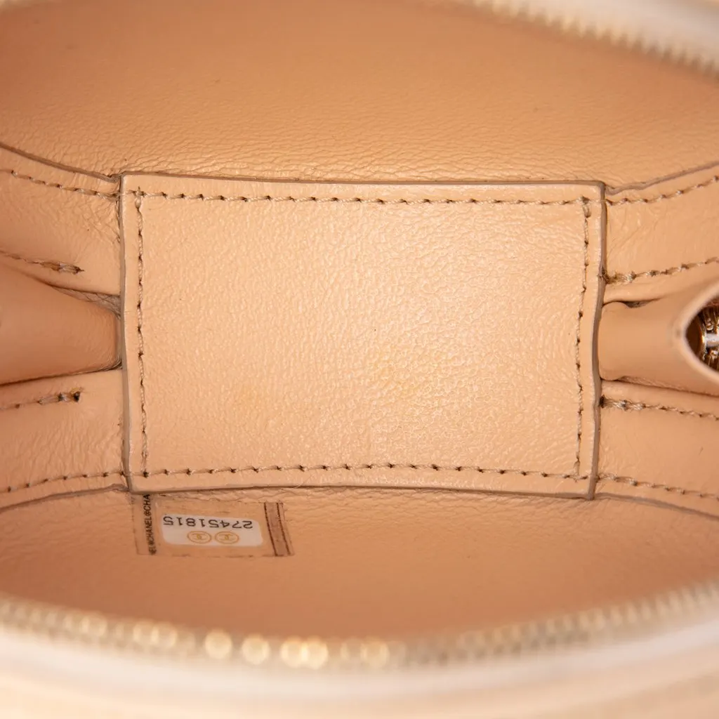 Chanel Stitched Calfskin Logo Strass and Pearl Chain Round Crossbody Beige Leather Very good - Model View