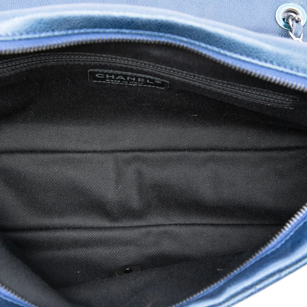 Chanel Jumbo Quilted Iridescent Caviar Easy Flap Blue Leather Good - Model View