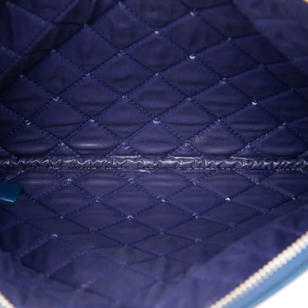 Chanel Medium Quilted Caviar Boy O Case Clutch Blue Leather Good - Model View