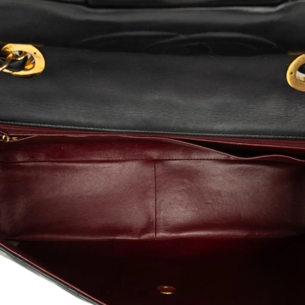 Chanel Maxi XL Classic Lambskin Single Flap Black Leather Very good - Model View