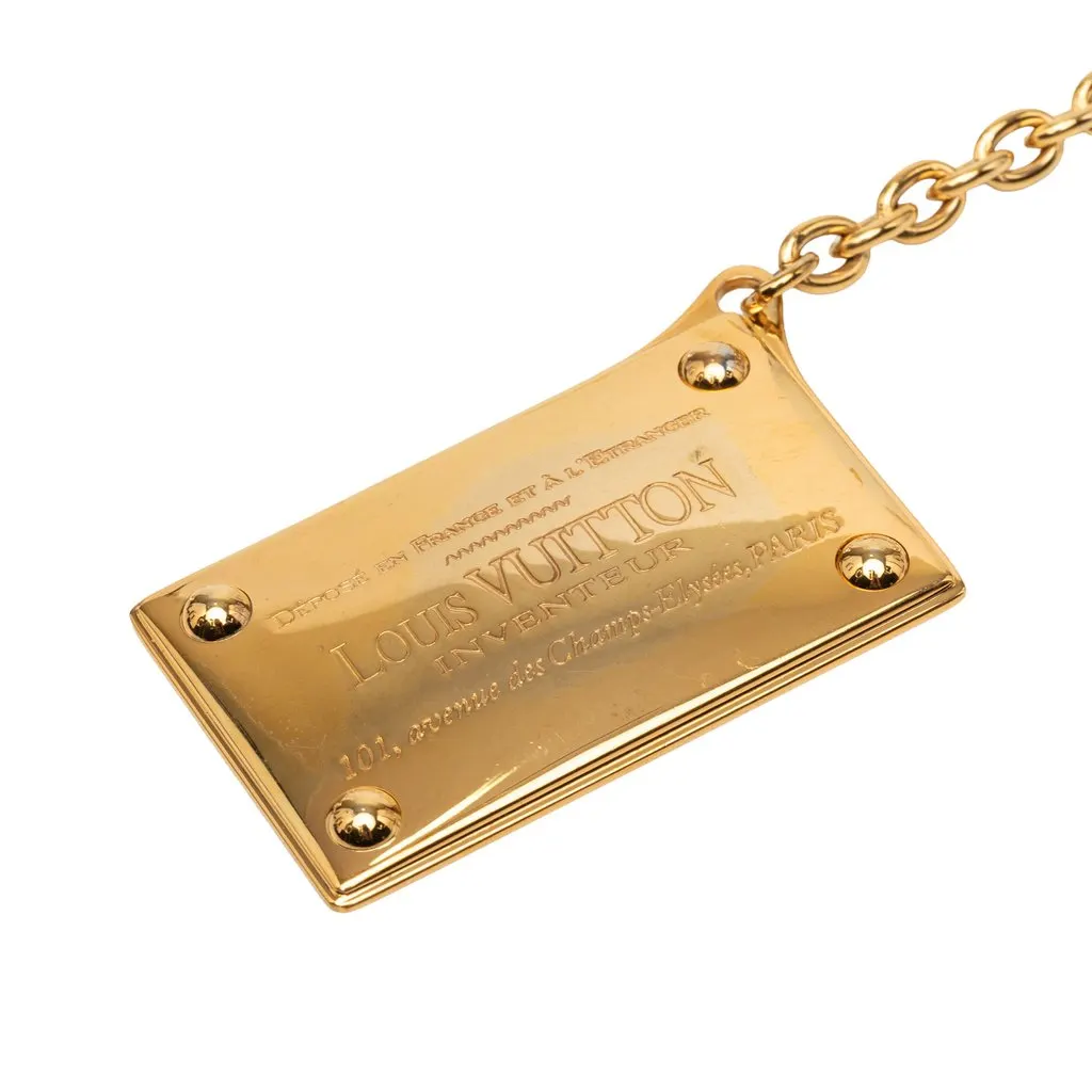 Louis Vuitton Gold Plated Inventeur Key Chain and Bag Charm Gold Metal Very good - Model View