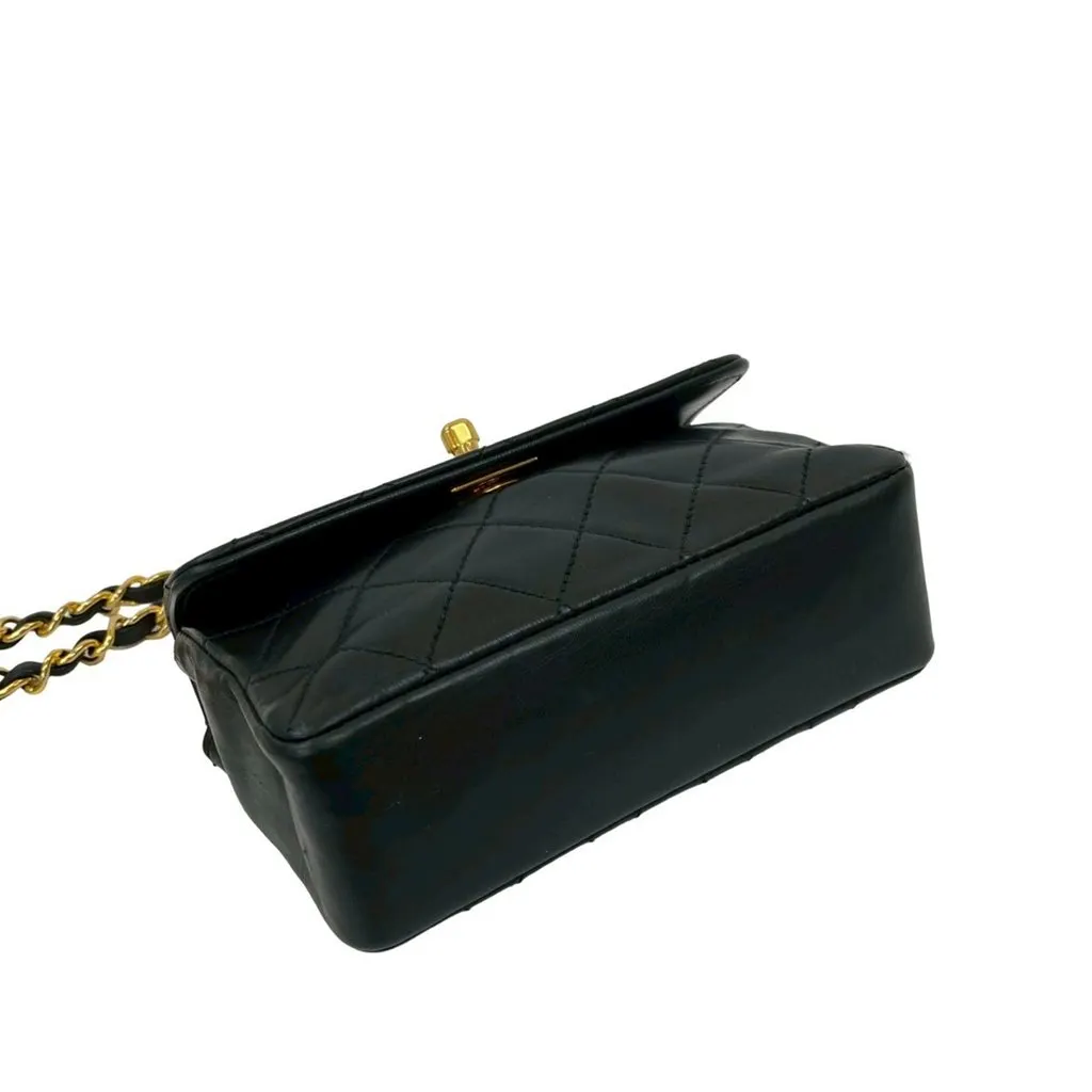 Chanel Micro CC Quilted Lambskin Turn Lock Flap Black Leather Good - Model View