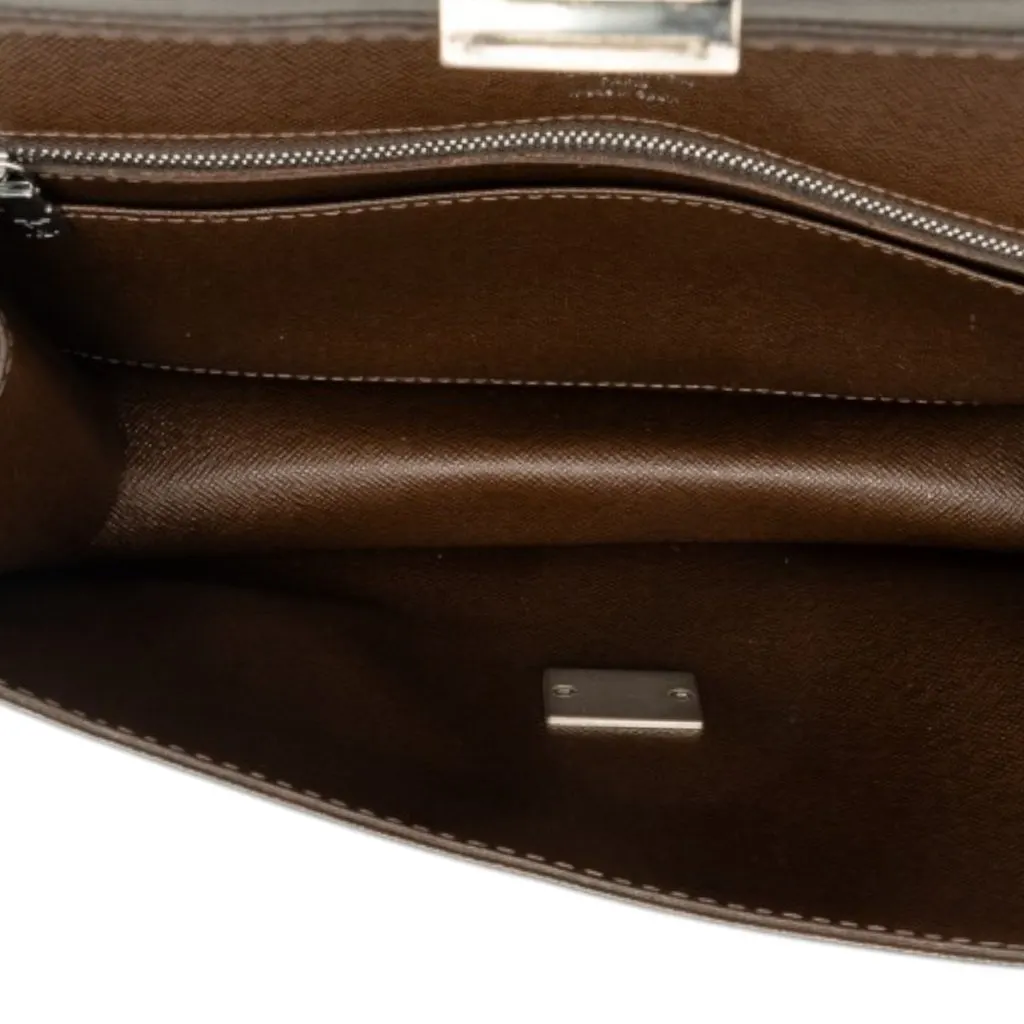 Louis Vuitton Taiga Selenga Brown Leather Good - Model View