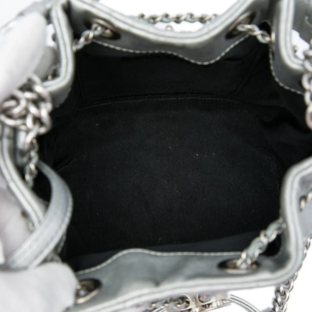 Chanel Small Metallic Chevron Lambskin Stud Wars Drawstring Bucket Bag Silver Leather Very good - Model View