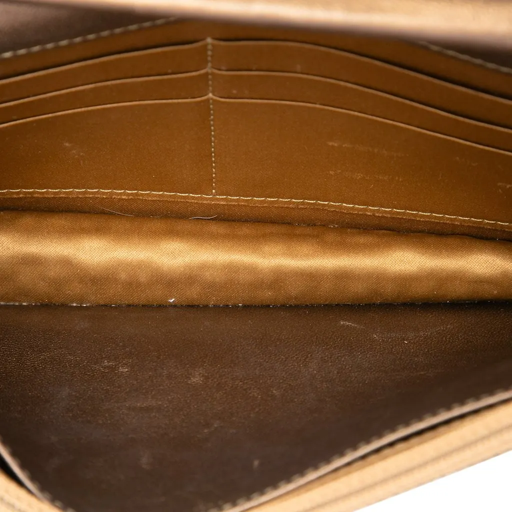 Chanel CC Embossed Metallic Lambskin Wallet on Chain Gold Leather Good - Model View