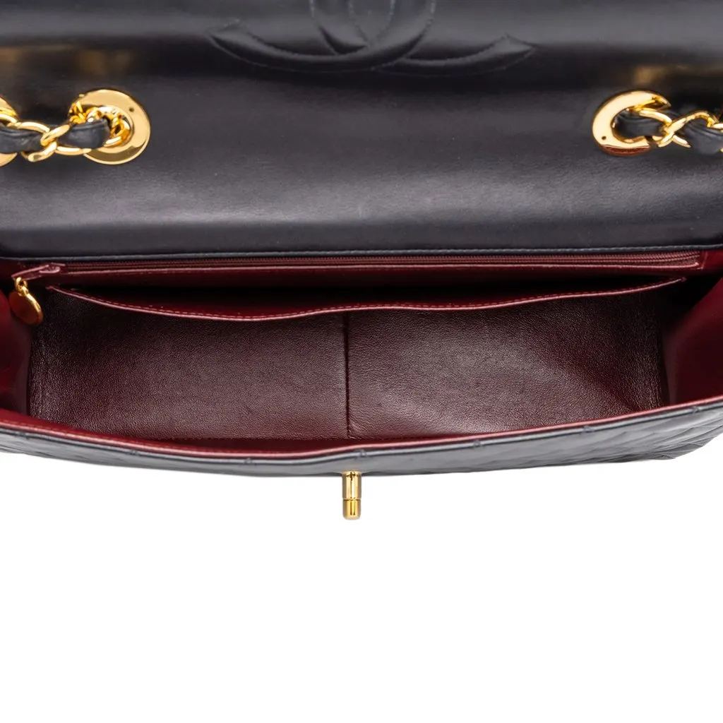 Chanel Maxi XL Classic Lambskin Single Flap Black Leather Good - Model View
