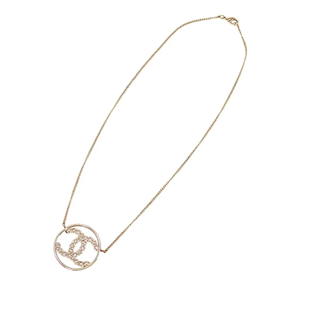 Chanel CC Gold Plated Strass Round Pendant Necklace Gold Metal Never worn - Front View