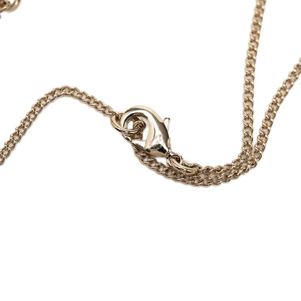 Chanel CC Gold Plated Faux Pearl Strass Deer Pendant Necklace Gold Metal Very good - Inside View