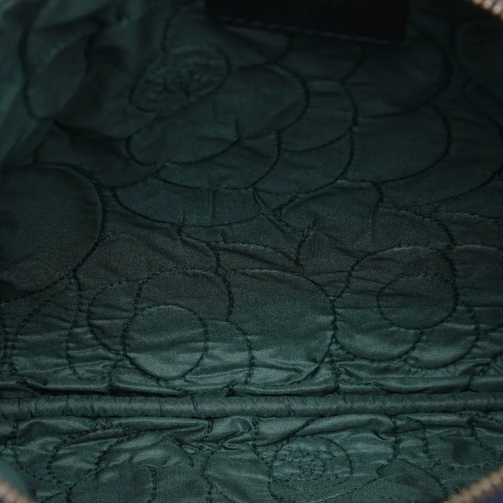 Chanel Medium CC Embossed Lambskin Camellia O Case Clutch Blue Leather Very good - Model View
