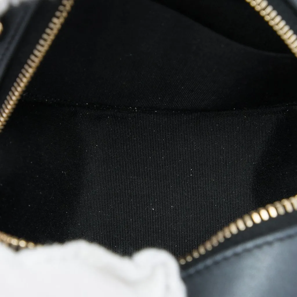 Chanel CC Quilted Iridescent Lambskin Pearl Round Clutch with Chain Black Leather Very good - Model View