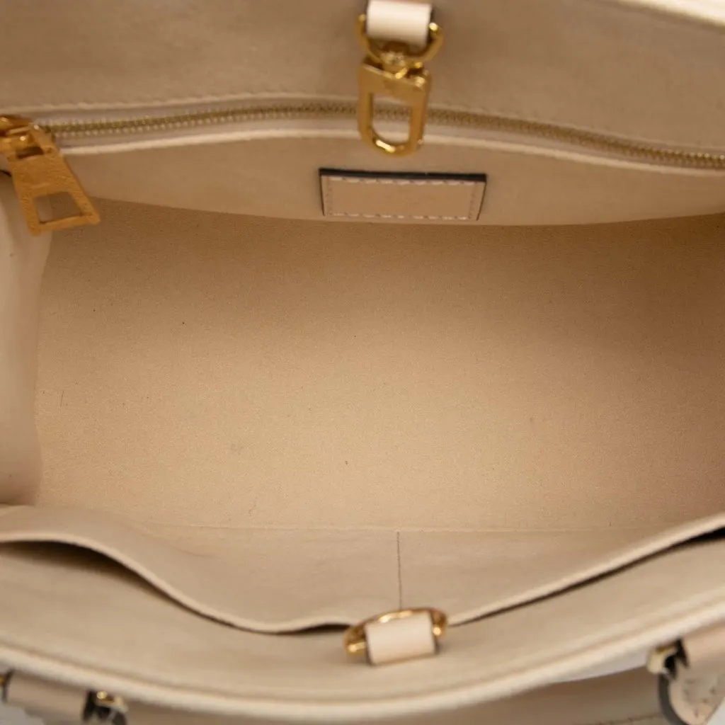 Louis Vuitton Monogram Empreinte Onthego PM Beige Leather Very good - Model View