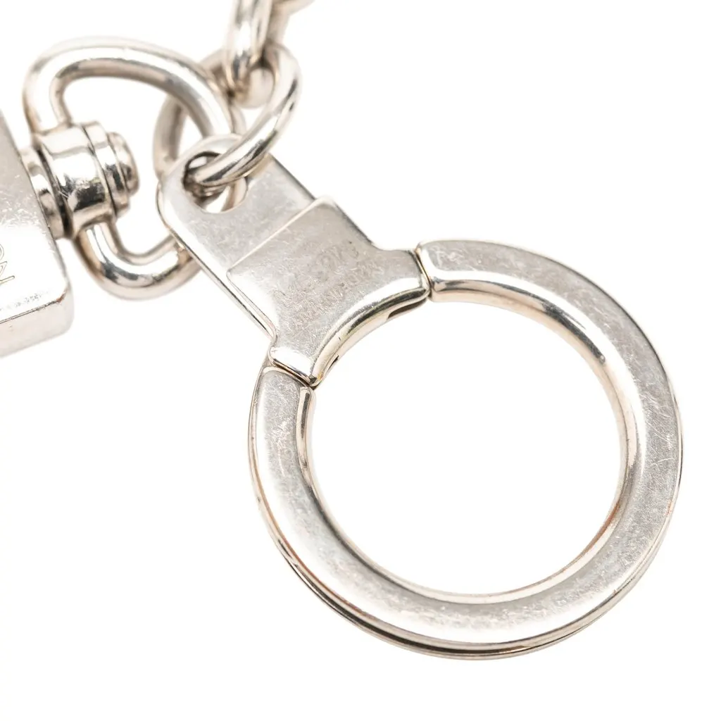 Louis Vuitton Brass LV Initiales Bag Charm Silver Metal Very good - Model View