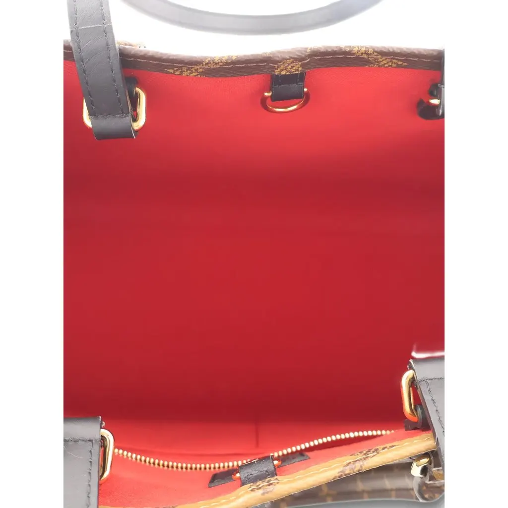 Louis Vuitton Monogram Reverse Giant OnTheGo MM Brown Canvas Good - Model View