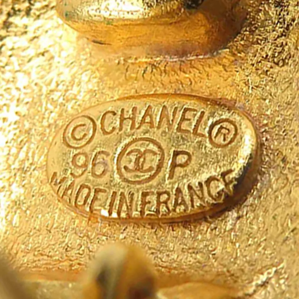 Chanel CC Gold Plated Quilted Round Clip On Earrings Gold Metal Very good - Model View