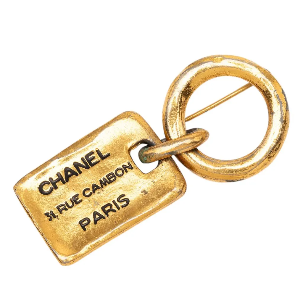 Chanel Gold Plated Rue Cambon Tag Brooch Gold Metal Very good - Front View