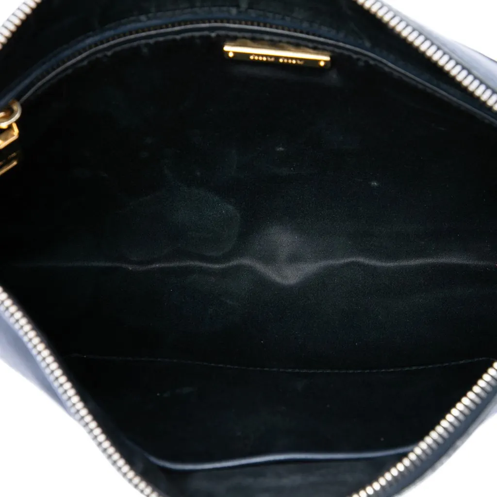 Miu Miu Studded Leather Zip Clutch Blue Leather Very good - Model View
