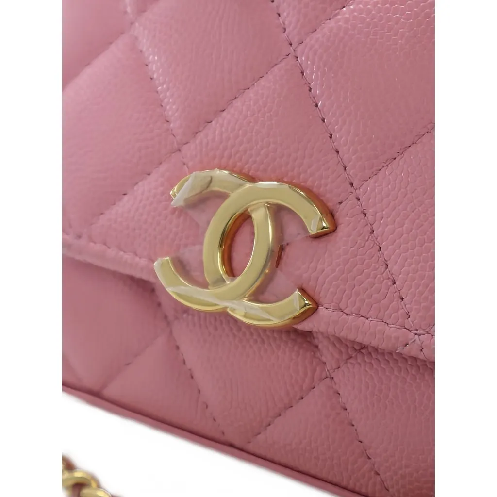 Chanel Mini CC Quilted Caviar Top Handle Clutch with Chain Pink Leather Good - Model View