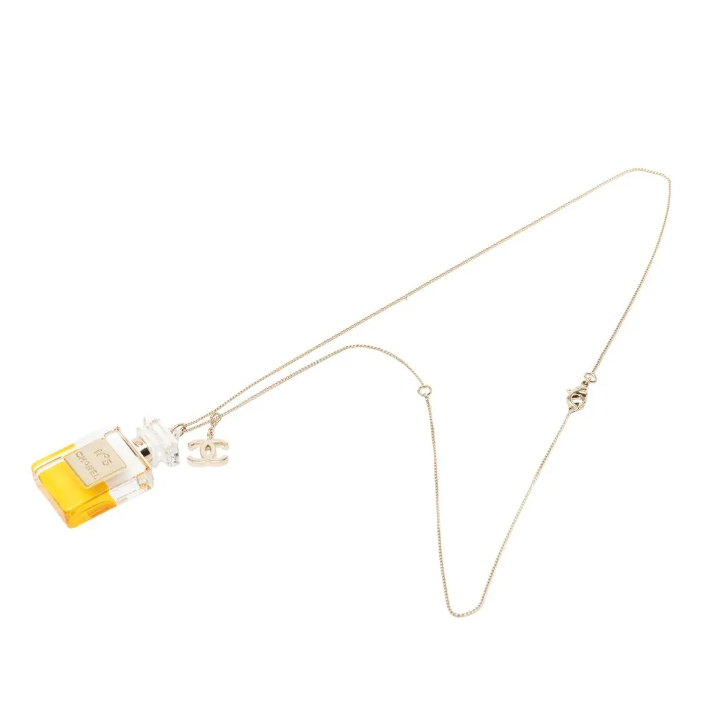 Chanel CC Gold Plated and Resin No 5 Perfume Bottle Pendant Necklace Gold Metal Very good - Front View