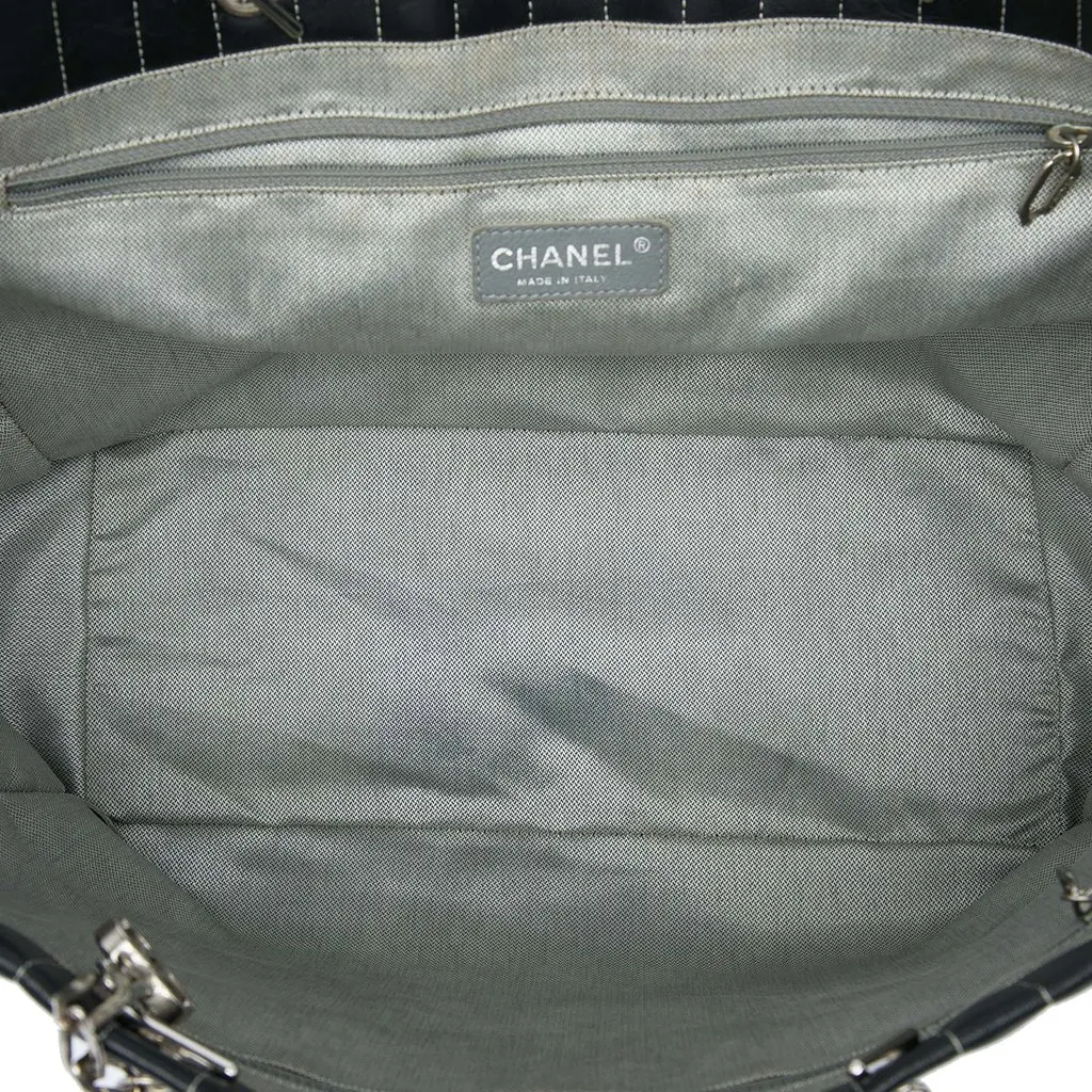 Chanel Large Lambskin Vertical Quilted Mademoiselle Tote Black Leather Very good - Model View