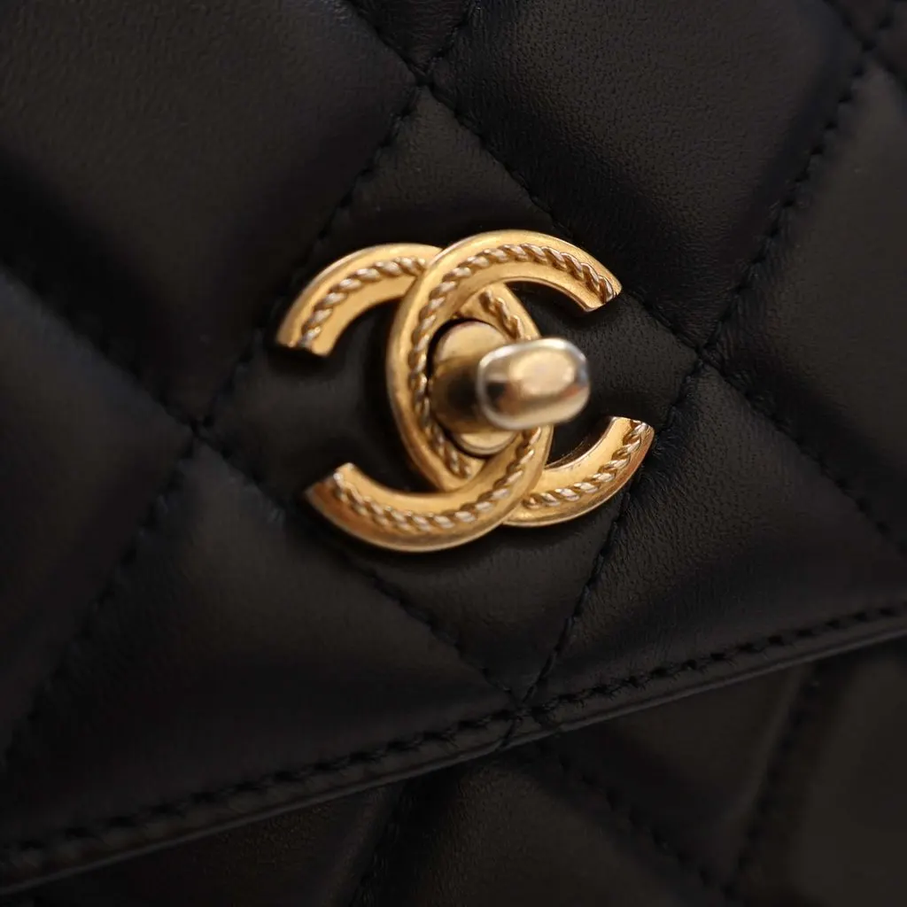 Chanel CC Quilted Lambskin Metal Twist Top Handle Flap Black Leather Very good - Model View