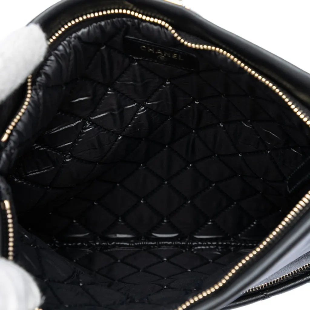 Chanel CC Quilted Lambskin Beauty Foldover Boy Clutch Black Leather Very good - Model View