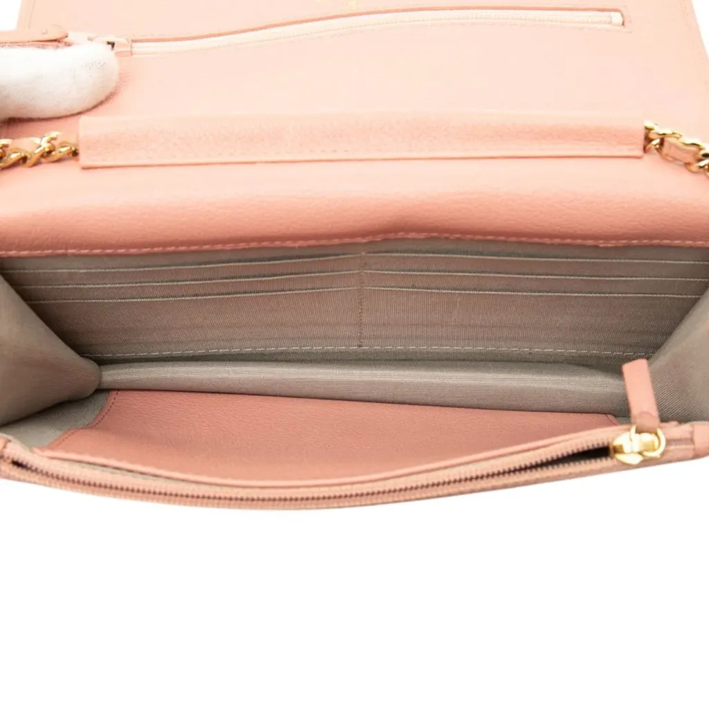 Chanel CC Calfskin Camellia Wallet On Chain Pink Leather Good - Model View