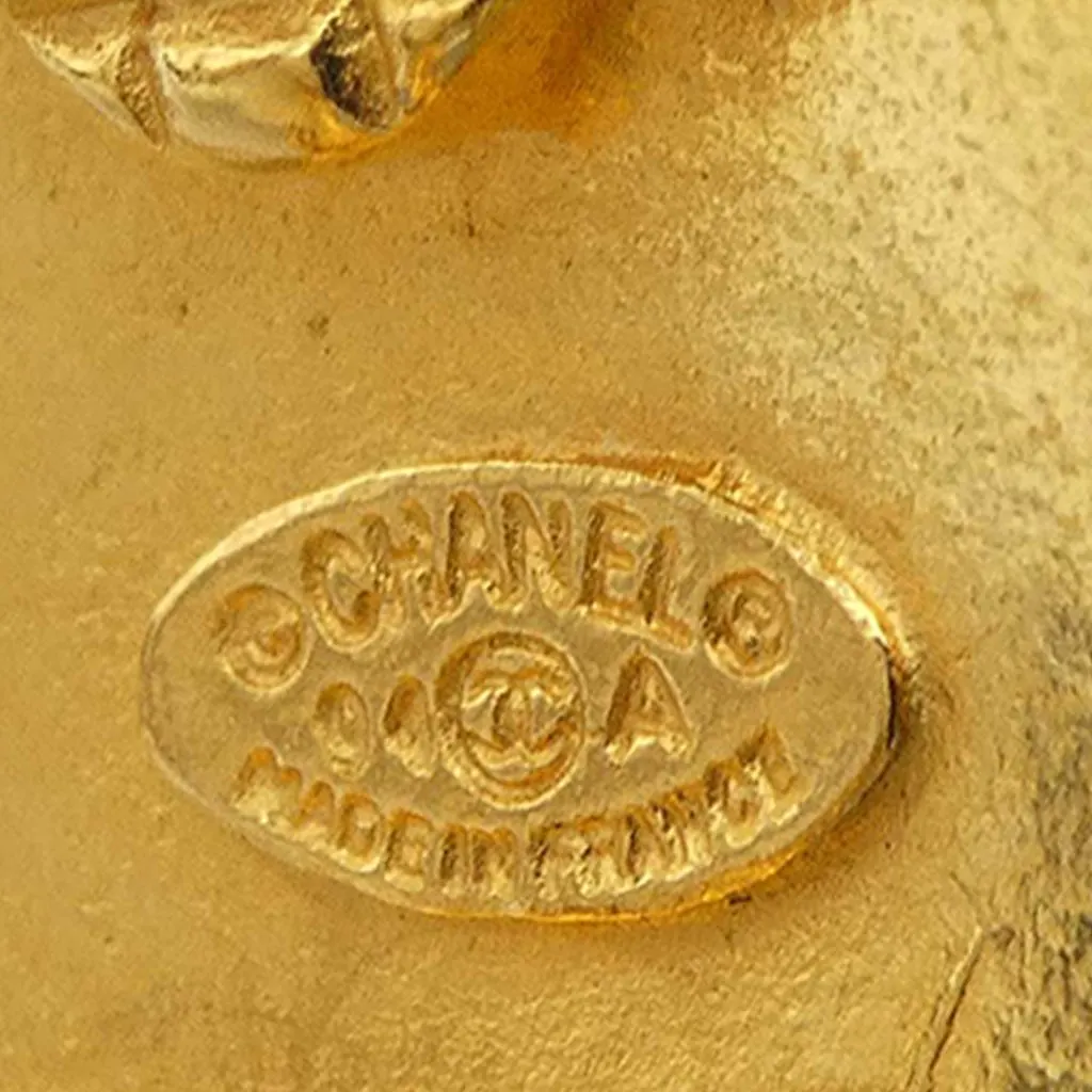 Chanel CC Gold Plated Round Clip On Earrings Gold Metal Very good - Model View