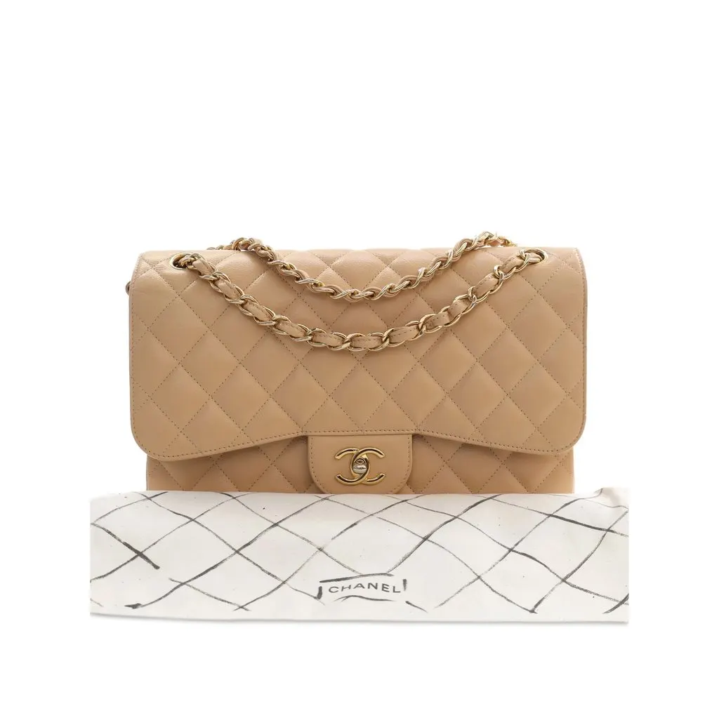 Chanel Jumbo Classic Caviar Double Flap Beige Leather Very good - Model View