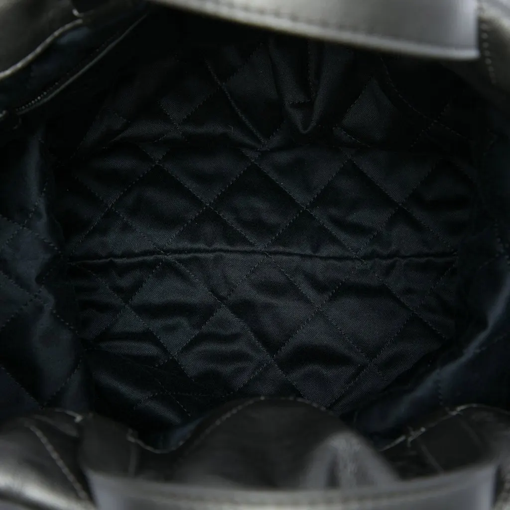 Chanel Large Quilted Shiny Calfskin 22 Backpack Black Leather Good - Model View