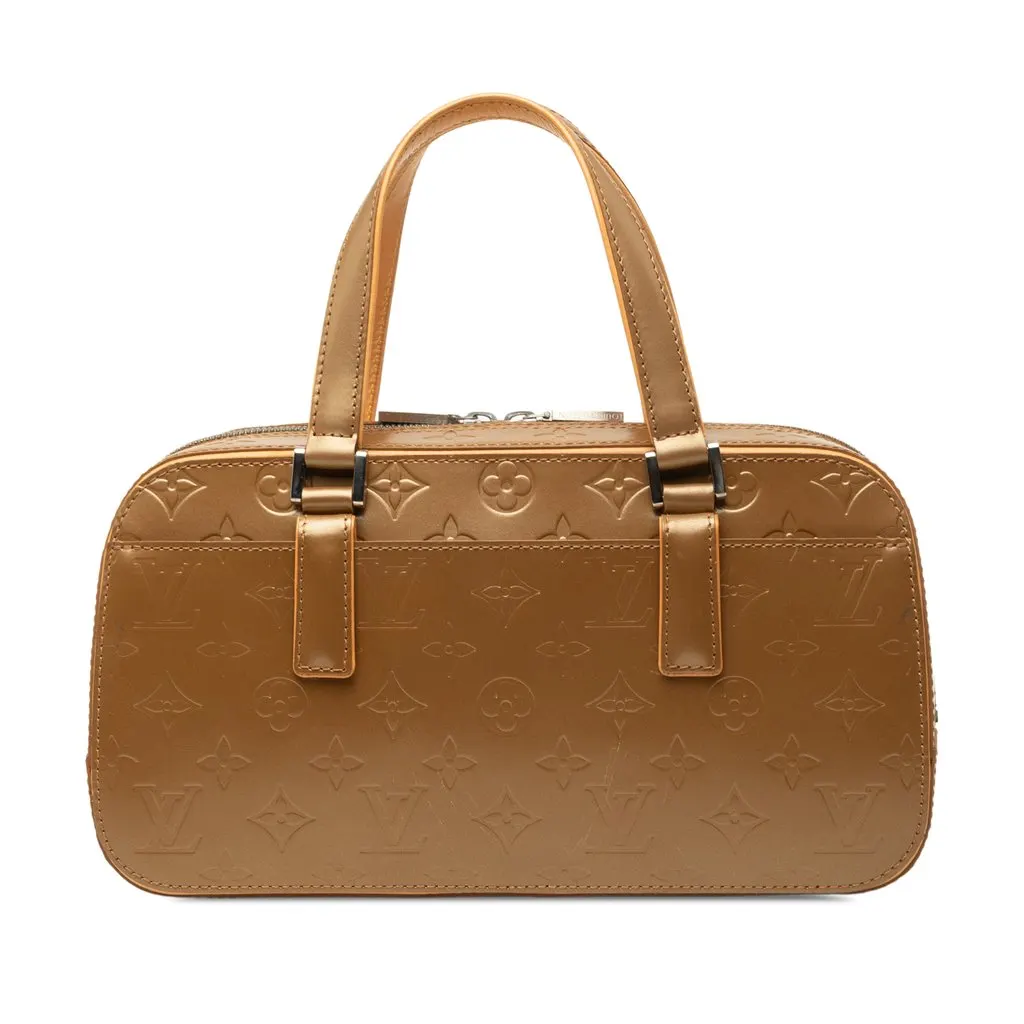 Louis Vuitton Monogram Mat Shelton Gold Leather Good - Front View