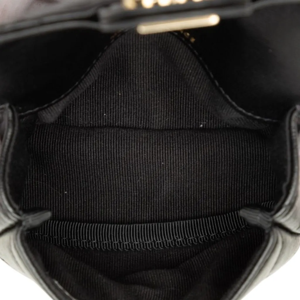 Chanel CC Quilted Lambskin Flap Arm Coin Purse Black Leather Very good - Model View