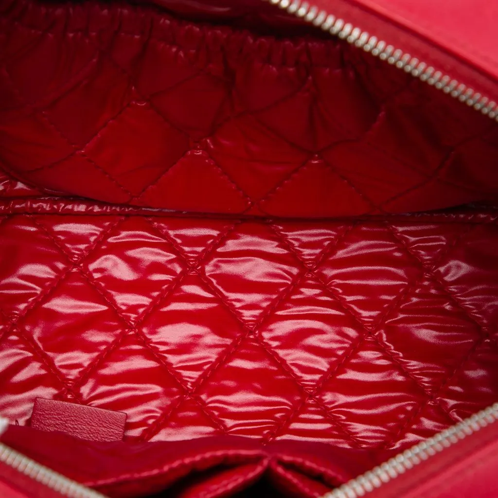 Chanel Medium Quilted Lambskin Curvy Cosmetic Pouch Red Leather Very good - Model View