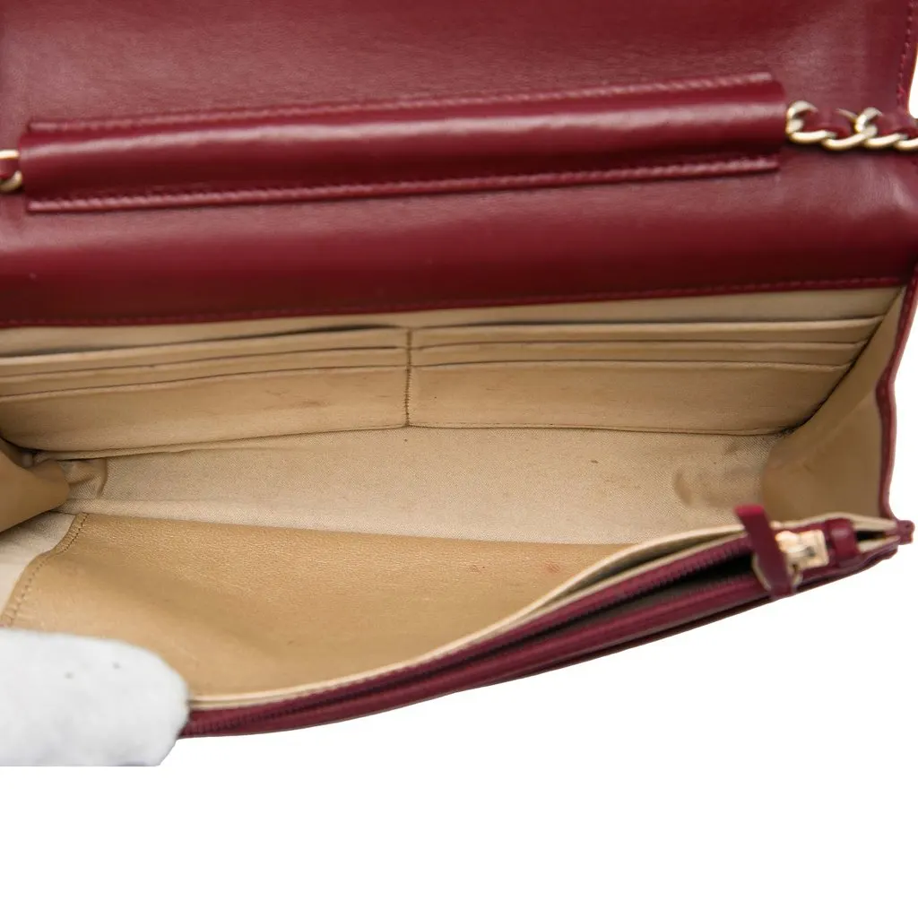 Chanel CC Embossed Calfskin Camellia Wallet On Chain Red Leather Very good - Model View