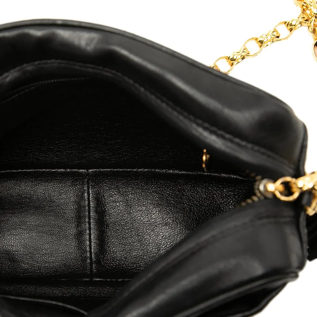 Chanel CC Vertical Quilted Lambskin Tassel Camera Bag Black Leather Very good - Model View