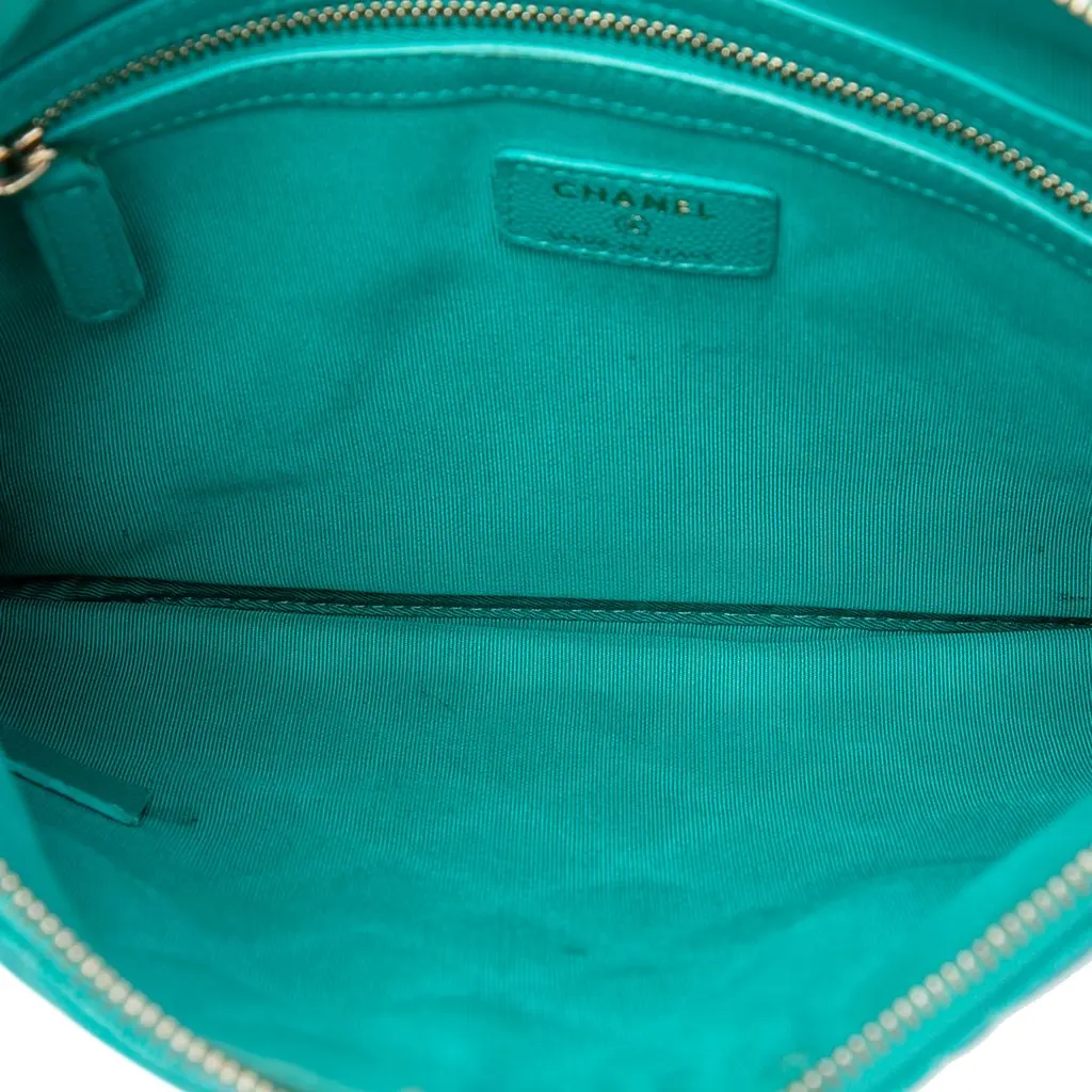 Chanel Medium Quilted Caviar O Case Clutch Blue Leather Good - Model View