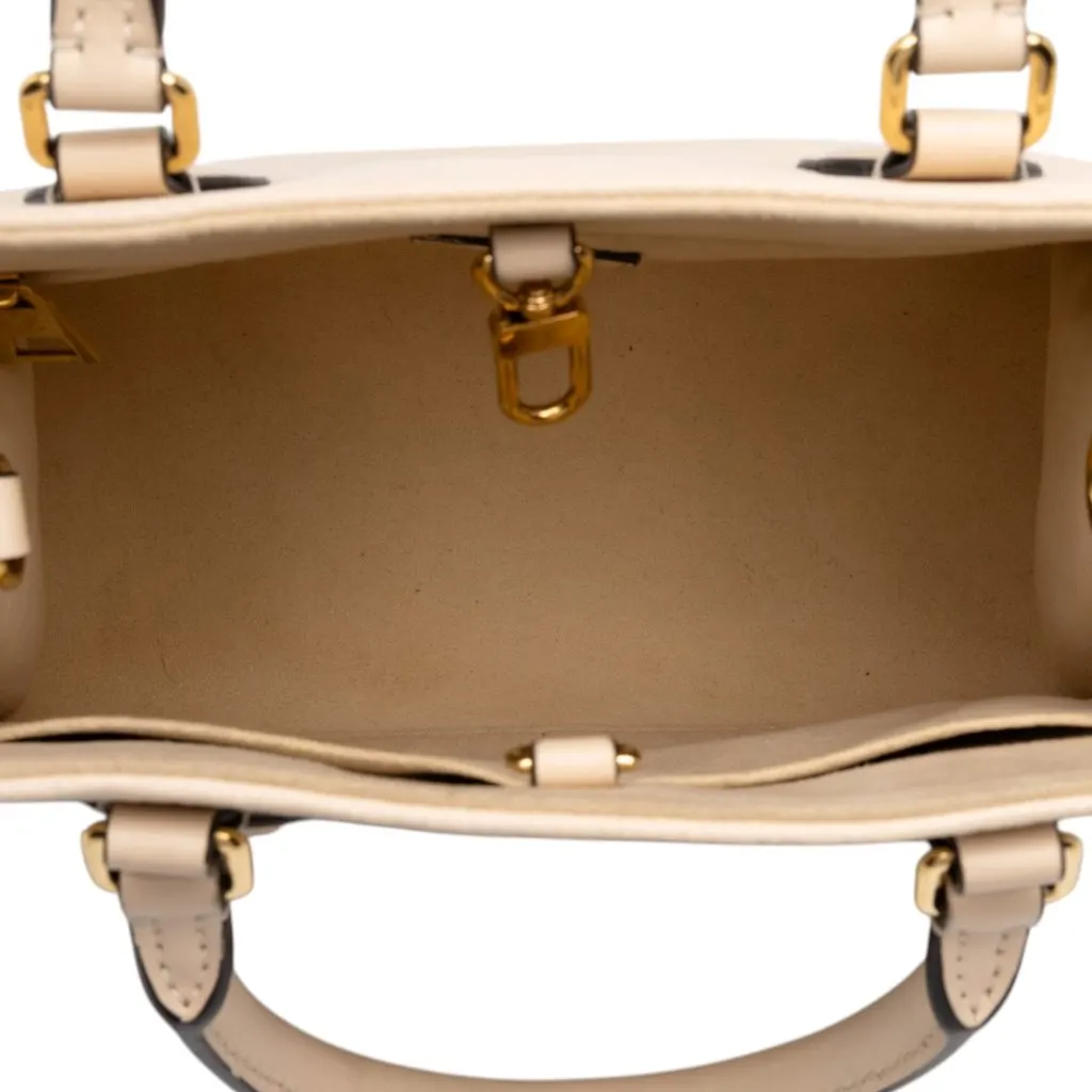 Louis Vuitton Monogram Empreinte Giant OnTheGo PM Beige Leather Very good - Model View