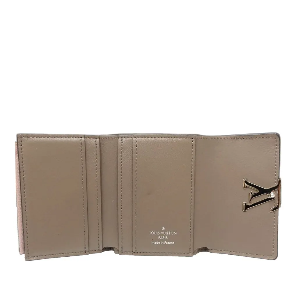 Louis Vuitton Taurillon Capucines Compact Wallet Pink Leather Very good - Model View
